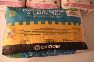 lot 150 image: Three Bags Of Polyblend Sanded Grout--Custom Natural Stone & Large Tile