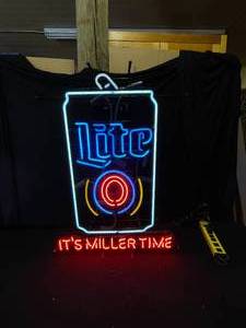 lot 22 image: Miller Lite beer can neon sign, #Its Miller time
