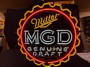 lot 39 image: MGD Miller Genuine Draft bottle cap neon