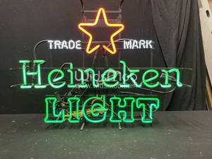 lot 77 image: Heineken Light neon with trademark red star