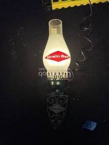 lot 83 image: Grain Belt Beer hurricane lamp  wall sconce