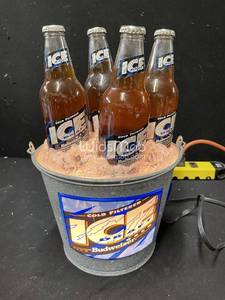 lot 88 image: Bud Ice light up bucket with 4 bottles