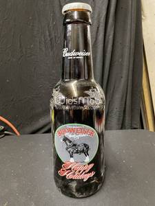 lot 104 image: Budweiser big bottle Happy Holidays