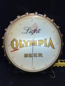 lot 90 image: Olympia Light bottle cap clock - back lit plastic