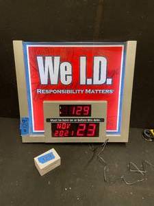 lot 129 image: Responsibility Matters, We I.D clock  LED