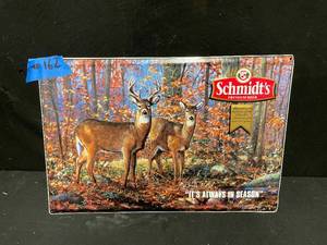 lot 162 image: Schmidts Premium Beer, Its Always in Season tin sign with buck