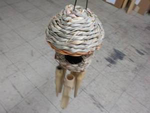 Bamboo bird house with chimes and a...