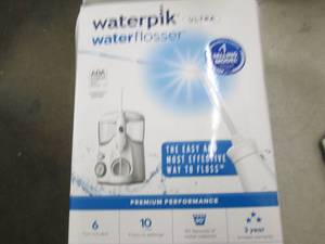 water pik water flosser open box ...