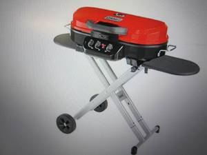 coleman roadtrip LXE 20,000 3 burner...