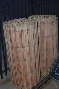 lot 14 image: 2 large rolls of wood snow fencing