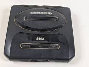 lot 21 image: Retro Sega Genesis Console ONLY (Valued $100)