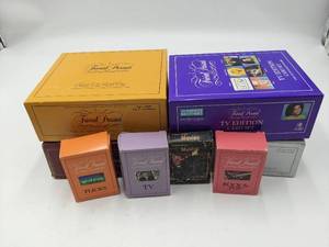 lot 39 image: Awesome Trivial Pursuit Collection-TV Edition Card Set  Silver Screen Edition  Genus II Edition Baby Boomer Edition Movies Rock & Pop TV Flicks