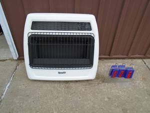 New Dynaglo LPNatural gas wall heater. 30000 BTU. Vent free. As shown.