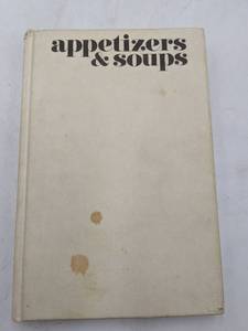 lot 67 image: 7 Fun Vintage Cook Books-365 ways To Cook a Hamburger Simple Abundance A Daybook of Comfort & Joy Appetizers & Soups James Beards Menus For Entertaining The Best of Bon Appetit