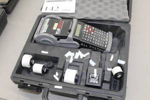 lot 142 image: Brady Thermal Label System TLS2200 Battery, Charger, Case, Label Accessories