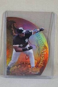 lot 24 image: 1999 Metal Universe Planet Metal Frank Thomas Die Cut #7