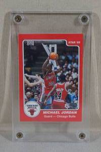 lot 34 image: 1996 Topps REPRINT of 1985 Star Michael Jordan #101 Rookie Card