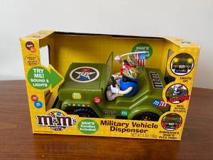 lot 13 image: M&Ms Jeep Candy Dispenser