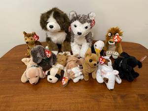 lot 49 image: Lot of 12 Ty Plushes - Mostly Dogs