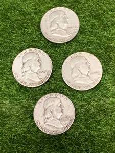 Lot of Four Franklin Half Dollars
