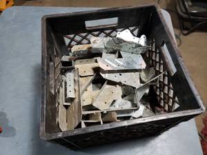 Milk Crate Full of Brackets