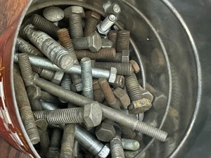 Four Cans filled with Nuts, Bolts, Tools, etc.