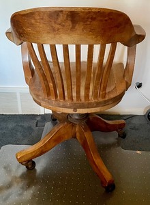 lot 7 image: Vintage Wooden Office Chair on Casters