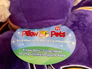 lot 236 image: New Minnesota Vikings Snuggie and Pillow Pet