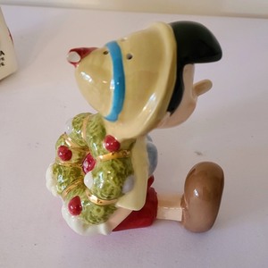 lot 295 image: Pinocchio Salt and Pepper Shakers