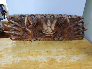 lot 8 image: Hand Carved Wall Hanging