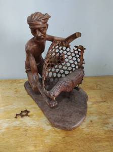 lot 10 image: Hand Carved Wood Male Figure with Chicken