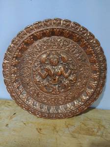 lot 20 image: Round Metal Plate Wall Art