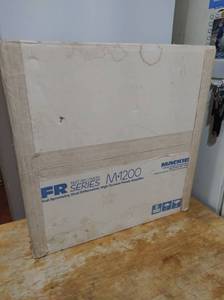 lot 40 image: Mackie M-1200 Professional Power Amplifier- Appears to be New in Box