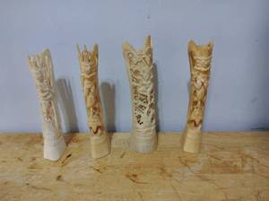 lot 63 image: Four Hand Carved Figures