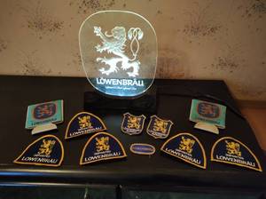 lot 113 image: Lowenbrau Lighted Beer Sign with Patches and More