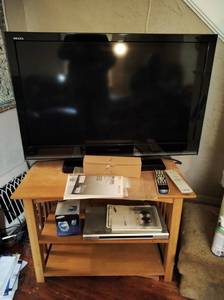 lot 177 image: 40 Toshiba TV with Stand and Other Electronics