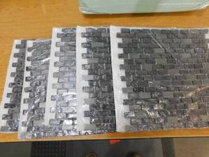 lot 95 image: (5) Jeffrey Court Palazzo Silver Metallic 11.875 in. x 11.375 in. Interlocking Brick Textured Glass Mosaic Tile (0.938 sq. ft.Each)