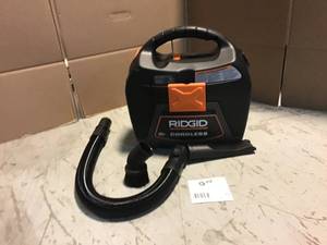 lot 29 image: RIDGID 3 Gal. 18-Volt Cordless Handheld WetDry Shop Vacuum (Tool Only) Customer Returns See Pictures