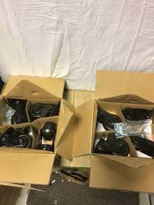lot 57 image: Husky 4 in. Caster Kit for Heavy Duty Welded Steel Garage Base Cabinets Customer Returns See Pictures