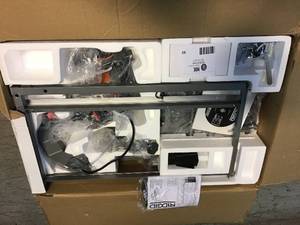 lot 92 image: RIDGID 9 Amp Corded 7 in. Wet Tile Saw with Stand Customer Returns See Pictures