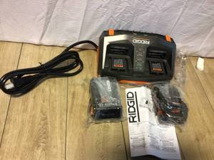 lot 2 image: RIDGID 18V Lithium-Ion Battery and Charger Starter Kit with (1) 4.0 Ah Batteries and (1) 1.5 Ah Batteries Customer Returns See Pictures