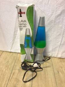 lot 24 image: Lava 14.5 in. Silver Vortex Lamp Customer Returns See Pictures