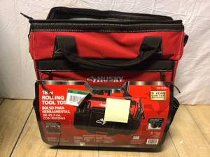 lot 45 image: Husky 18 in. 18 Pocket Rolling Tool Bag Customer Returns See Pictures