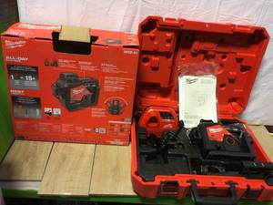lot 58 image: Milwaukee M12 12-Volt Lithium-Ion Cordless Green 250 ft. 3-Plane Laser Level Kit with One 4.0 Ah Battery, Charger and Case Customer Returns See Pictures