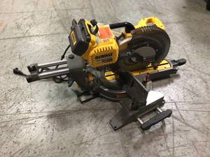 lot 103 image: FLEXVOLT 120-Volt MAX Cordless Brushless 12 in. Miter Saw  by DEWALT Customer Returns See Pictures