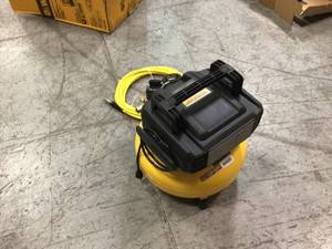lot 104 image: 6 Gal. 18-Gauge Brad Nailer and Heavy-Duty Pancake Electric Air Compressor Combo Kit (1-Tool) by DEWALT Customer Returns See Pictures