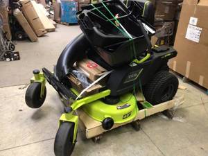 lot 108 image: 48-Volt Brushless 42 in. 100 Ah Battery Electric Riding Zero Turn Mower and Bagging Kit by RYOBI Customer Returns See Pictures