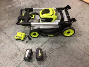 40V HP Brushless 21 in. Cordless Battery Walk Behind Self-Propelled Lawn Mower with (2) Batteries and Charger by RYOBI Customer Returns See Pictures