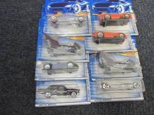 lot 119 image: 8 Assorted Hot Wheels Vehicles...