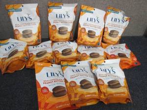 lot 122 image: 12- 3.2 oz Bags Lilys Milk Chocola...